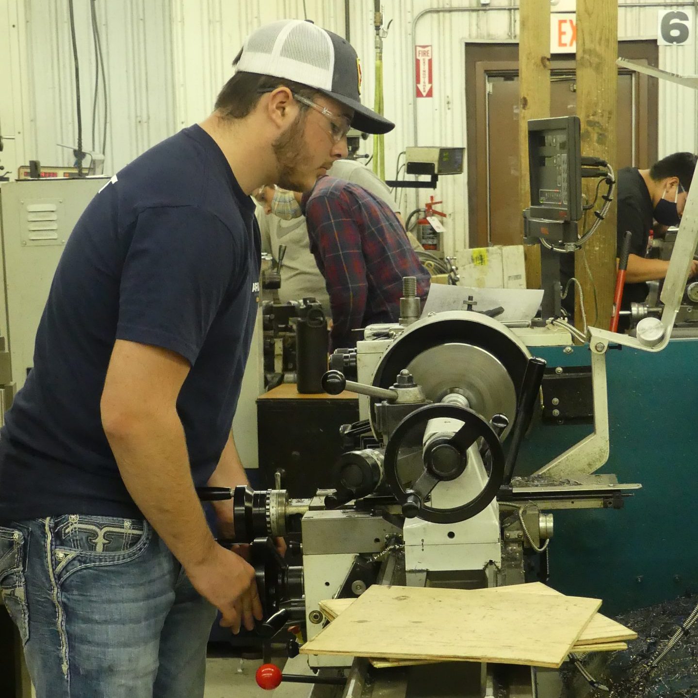 Student working on machine
